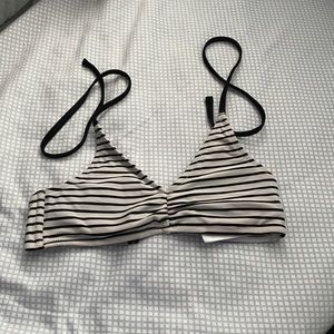 a triangle black and white bathing suit top